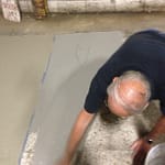 Spreading the Concrete Resurfacer
