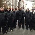 Crew in freezer suits