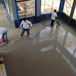 Pouring Out the Concrete Overlay